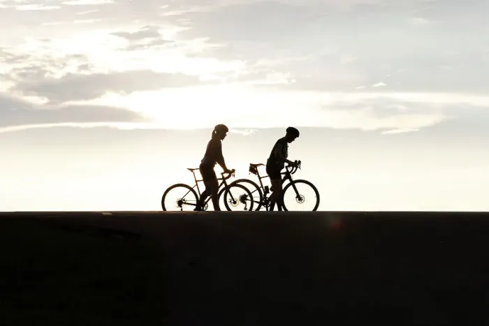 Framed Print : Silhouette of two female cyclists Framed Print : Silhouette of two female cyclists