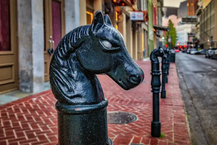 Framed Print : USA, Louisiana, New Orleans, street scene with horsehead hitching post Framed Print : USA, Louisiana, New Orleans, street scene with horsehead hitching post