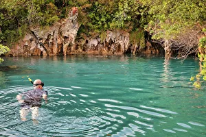 Island Prints: Bermuda, Blue Hole Park, Man snorkeling in aquamarine swimming hole