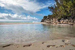 Atlantic Prints: Bermuda, private beach with footprints in the sand, at Rosewood Bermuda Hotel