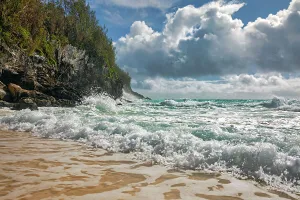Atlantic Prints: Bermuda, private beach with large rocks and crashing waves at Rosewood Bermuda Hotel