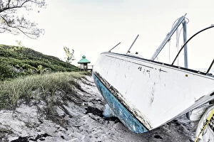 Images Dated 22nd May 2023: Boat wreck on beach with lifeguard tower in background