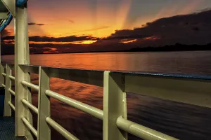 Brazil, sunset seen from ferry boat deck on Amazon river