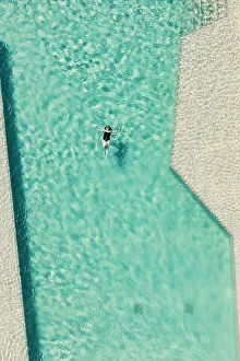 Vertical Prints: Colombia, Bird's eye view of Woman swimming