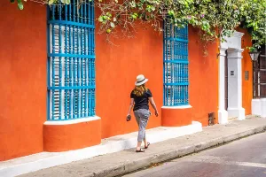 Colonial Prints: Colombia, Cartagena, typical street scene, woman walking