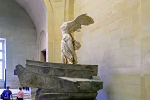 Statue Prints: EDITORIAL USE ONLY. France, Paris, Louvre Museum, The Winged Victory of Samothrace