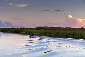 Blue Hour Prints: Family of three on small motor boat