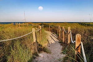 Images Dated 22nd May 2023: Florida, Delray Beach, pathway leading to beach with moon in sky