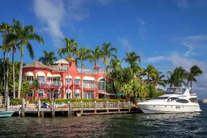 Florida, Fort Lauderdale, upscale home with yacht along the Intracoastal waterway