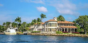 Florida, Fort Lauderdale, upscale home with yacht along the Intracoastal waterway