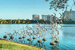 Lake Eola Prints: Florida, Orlando, Lake Eola, sculpture Take Flight by artist Douwe Blumberg