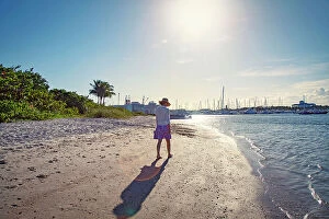 Images Dated 29th January 2020: Florida, Palm Beach County, Peanut Island, woman walking on the beach