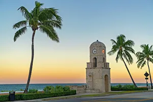 Florida, Palm Beach, Worth Avenue, Clock Tower along South Ocean Blvd at sunset