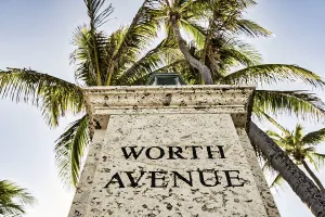 Florida, Palm Beach, Worth Avenue with palm trees