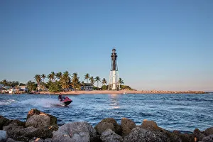 Florida, South Florida, Pompano Beach, view of Hillsboro lighthouse and fishing boat