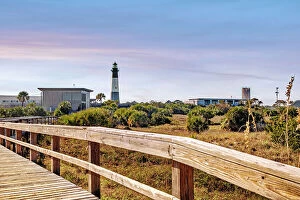 Images Dated 17th March 2023: Georgia, Tybee Island, wooden beach path and Tybee Lighthouse