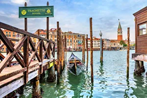 Italia Prints: Italy, Veneto, Venice, Gondola with typical architecture and Saint Mark's Campanile in the background