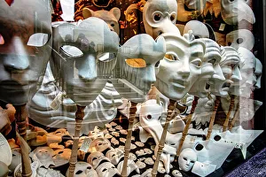 Italy, Venice, Souvenir shop with masks, window display
