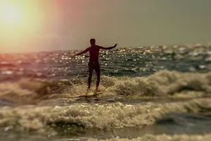 Atlantic Prints: Male surfer riding a wave