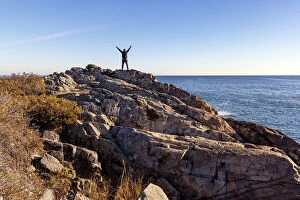 Images Dated 11th April 2023: Man Standing on Rocks along Marginal Way Trail