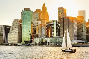 Light Prints: New York City, Lower Manhattan financial district and sailboat viewed from Brooklyn