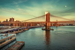 NYC, Manhattan, View of East River with Brooklyn Bridge near South Street and FDR Drive