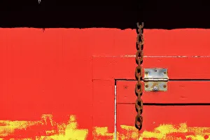 Home Prints: Red wooden structure with door hinge and chain