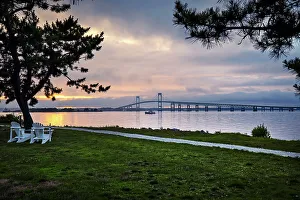 Rhode Island, Newport, adirondack chairs facing Claiborne Pell Bridge over Narragansett Bay