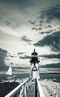 Images Dated 15th July 2022: USA, Nantucket, Massachusetts, New England, black and white Brant Point Lighthouse with a sailboat