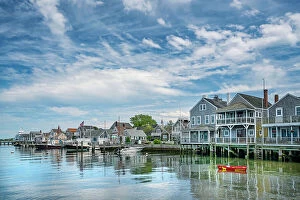: USA, Nantucket, Massachusetts, New England, shore houses and boats moored on a dock