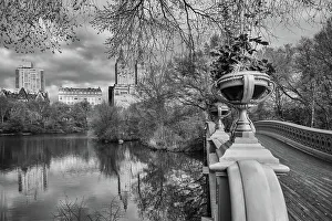 USA, New York City, Manhattan Central Park Bow Bridge and San Remo apartment building